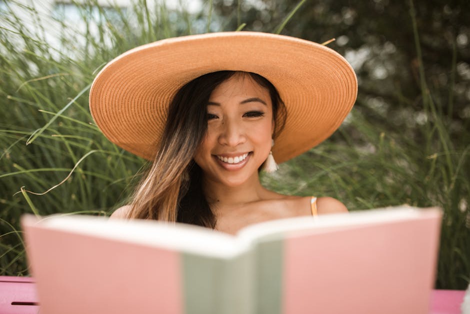 woman relaxing reading book outdoors