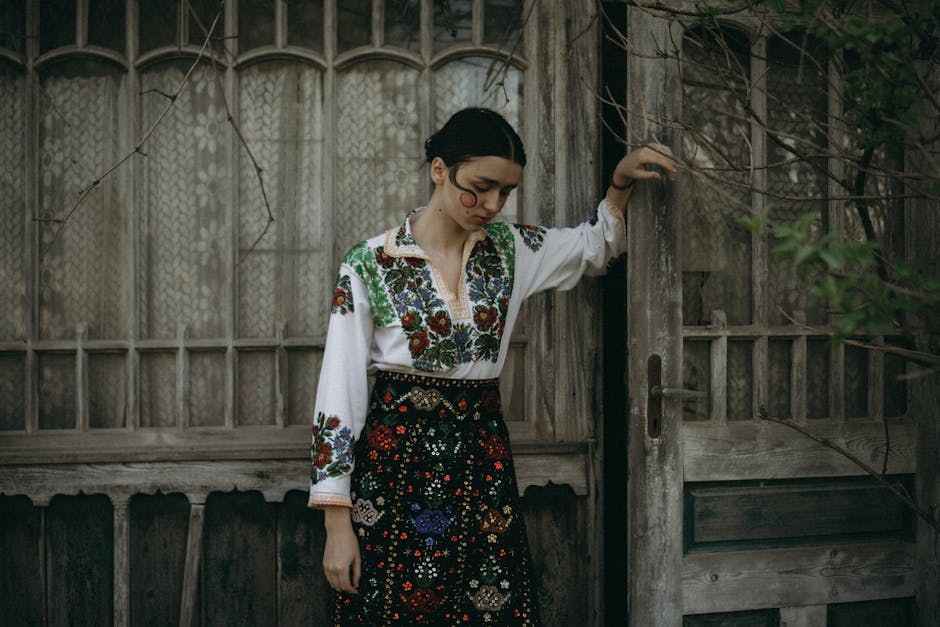 Woman wearing embroidered dress walking in city