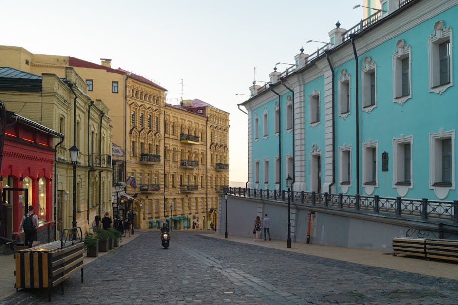 young woman walking historical street Kyiv